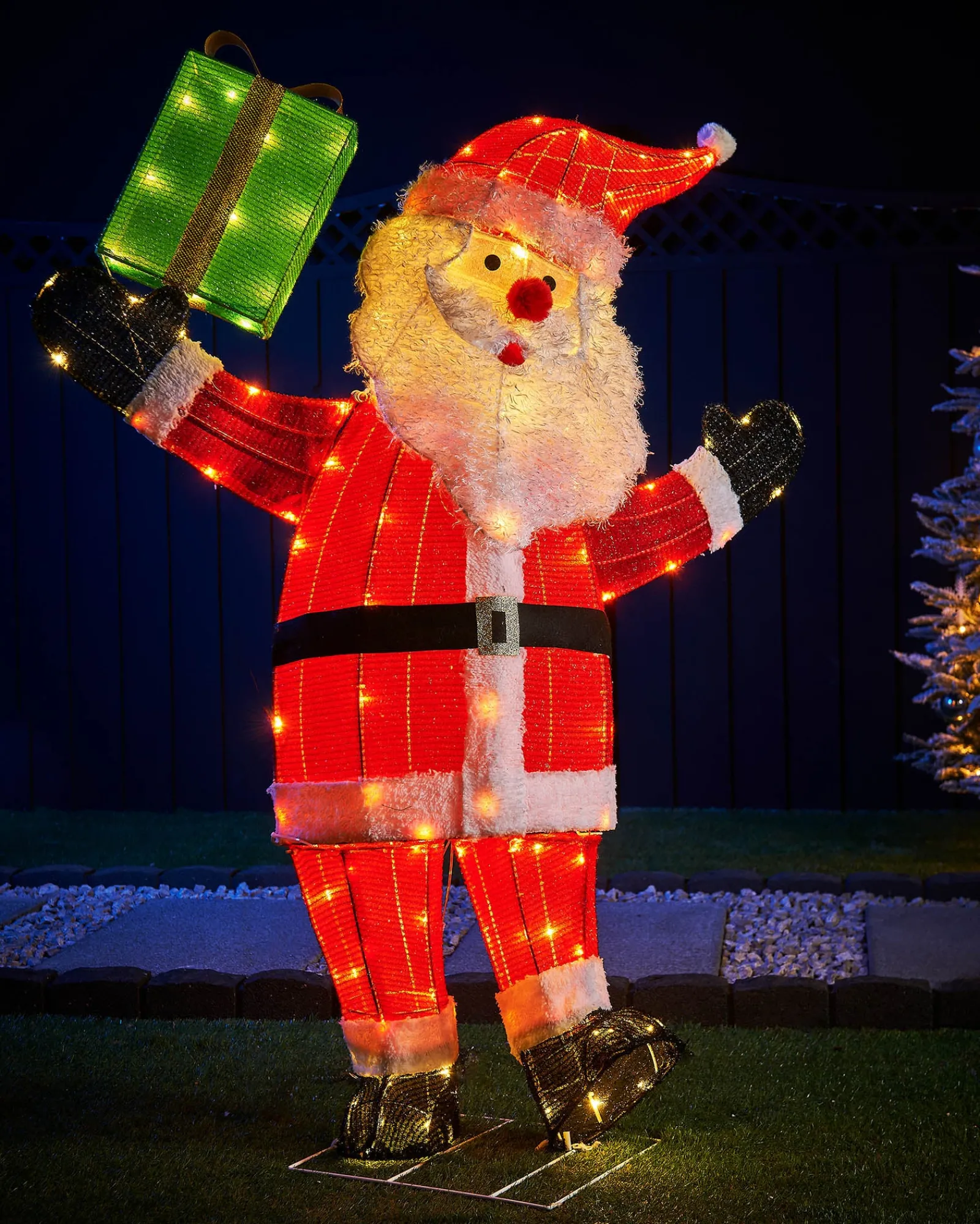 WeRChristmas 3D Tinsel Santa With Gift Box Silhouette