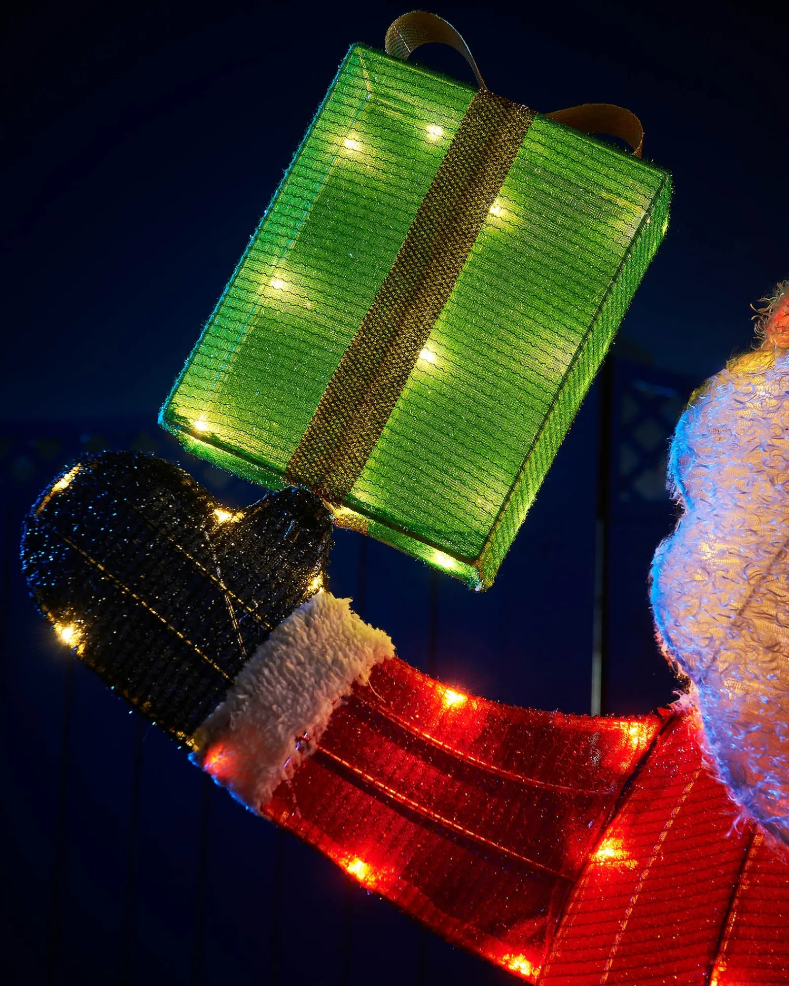 WeRChristmas 3D Tinsel Santa With Gift Box Silhouette