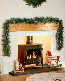 WeRChristmas Pre-Decorated Frosted Scandinavian Blue Spruce Garland, 9 Ft