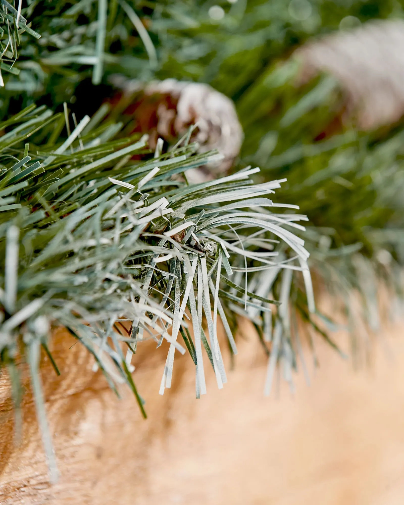 WeRChristmas Pre-Decorated Frosted Scandinavian Blue Spruce Garland, 9 Ft