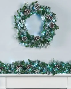WeRChristmas Pre-Lit Decorated Snow Flocked Garland, Pinecones, 9 Ft