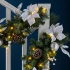 WeRChristmas Pre-Lit Extra Thick Decorated Garland, Silver/White, 9 Ft