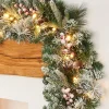 WeRChristmas Pre-Lit Extra Thick Mixed Pine Snow Flocked Garland, Pinecones & Berries, 9 Ft
