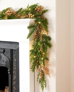 WeRChristmas Pre-Lit Gold Berry Mixed Tip Garland, 9 Ft