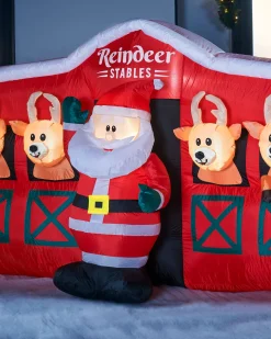 WeRChristmas Pre-Lit Inflatable Santa & Reindeer Stables, 8.5 Ft