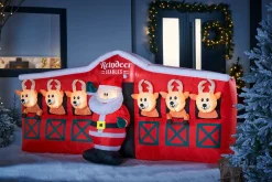 WeRChristmas Pre-Lit Inflatable Santa & Reindeer Stables, 8.5 Ft