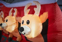 WeRChristmas Pre-Lit Inflatable Santa & Reindeer Stables, 8.5 Ft