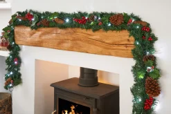 WeRChristmas Pre-Lit Natural Decorated Garland, Pinecones & Berries, 9 Ft