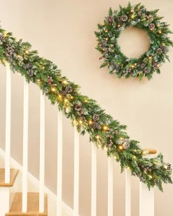 WeRChristmas Pre-Lit Snow Flocked Mixed Tip Garland, 9 Ft
