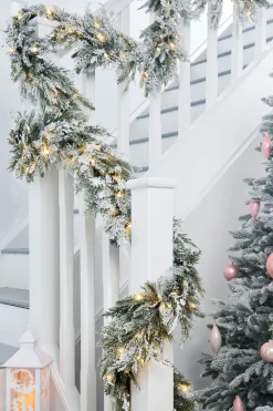WeRChristmas Pre-Lit Snow Flocked Natural Fir Garland, 18 Ft