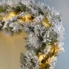 WeRChristmas Pre-Lit Snow Flocked Spruce Garland, 9 Ft