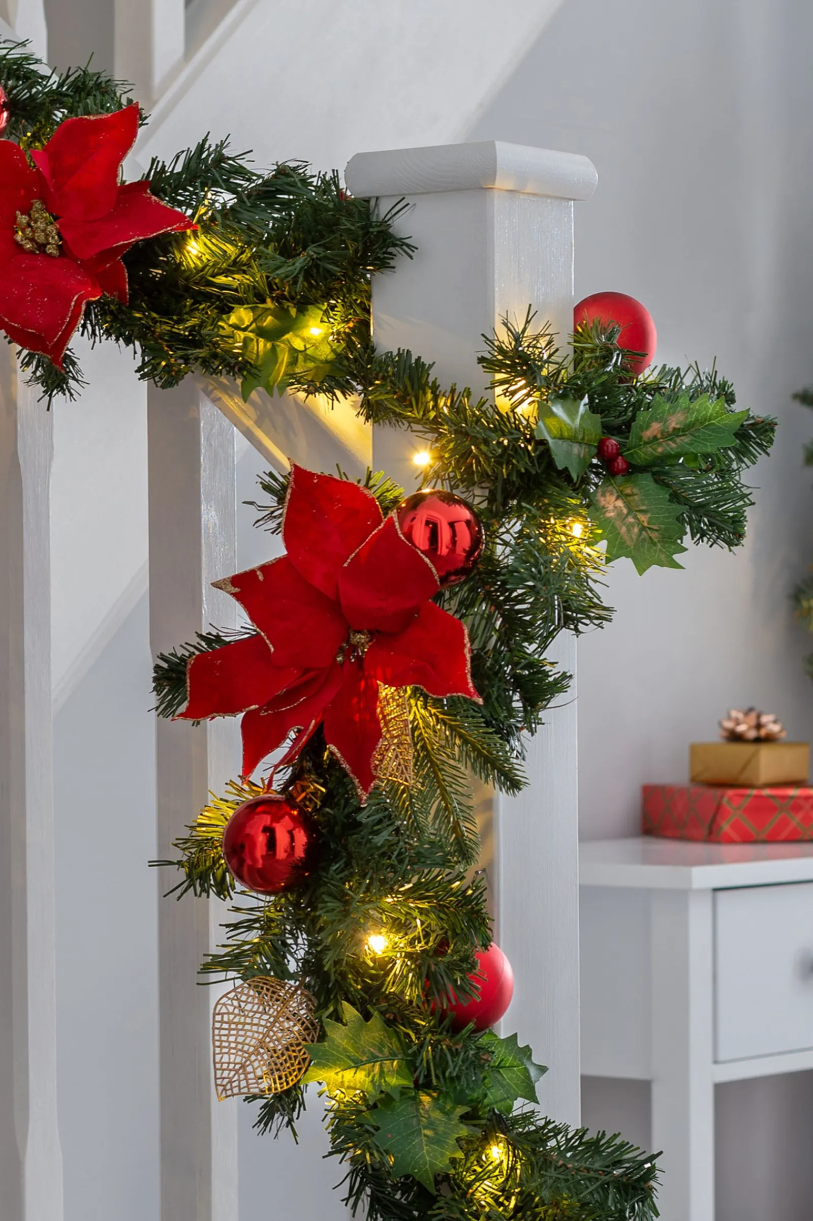 WeRChristmas Pre-Lit Warm White Decorated Garland, Red/Gold, 9 Ft